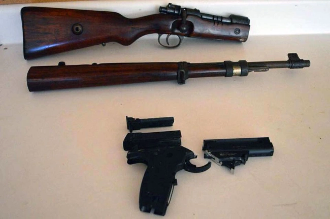 cut-guns two guns cut in half