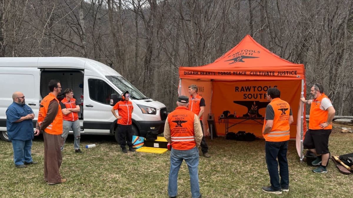 FSO training pic a man and woman hammering metal on an anvil